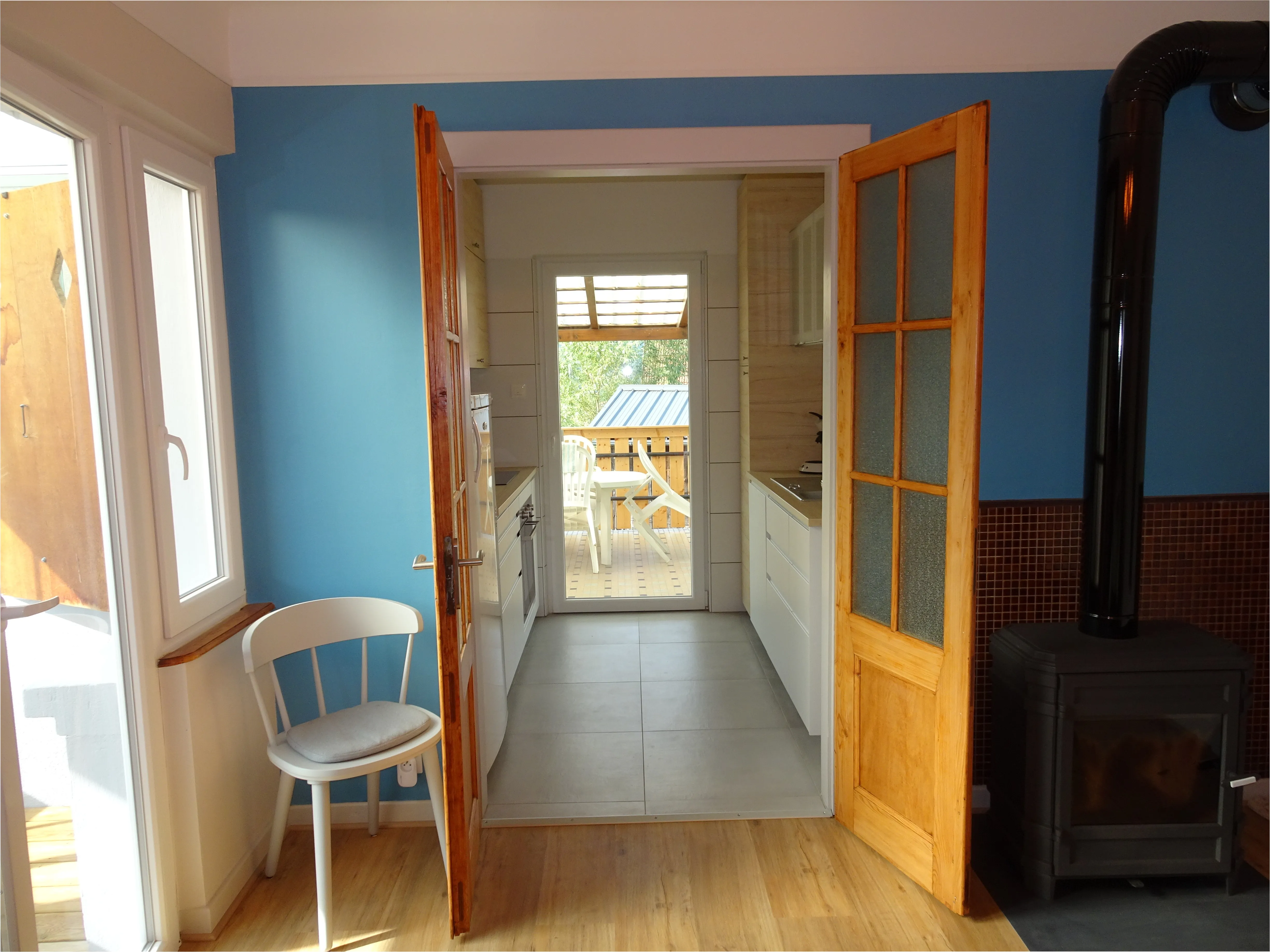 Double doors between kitchen and dining room