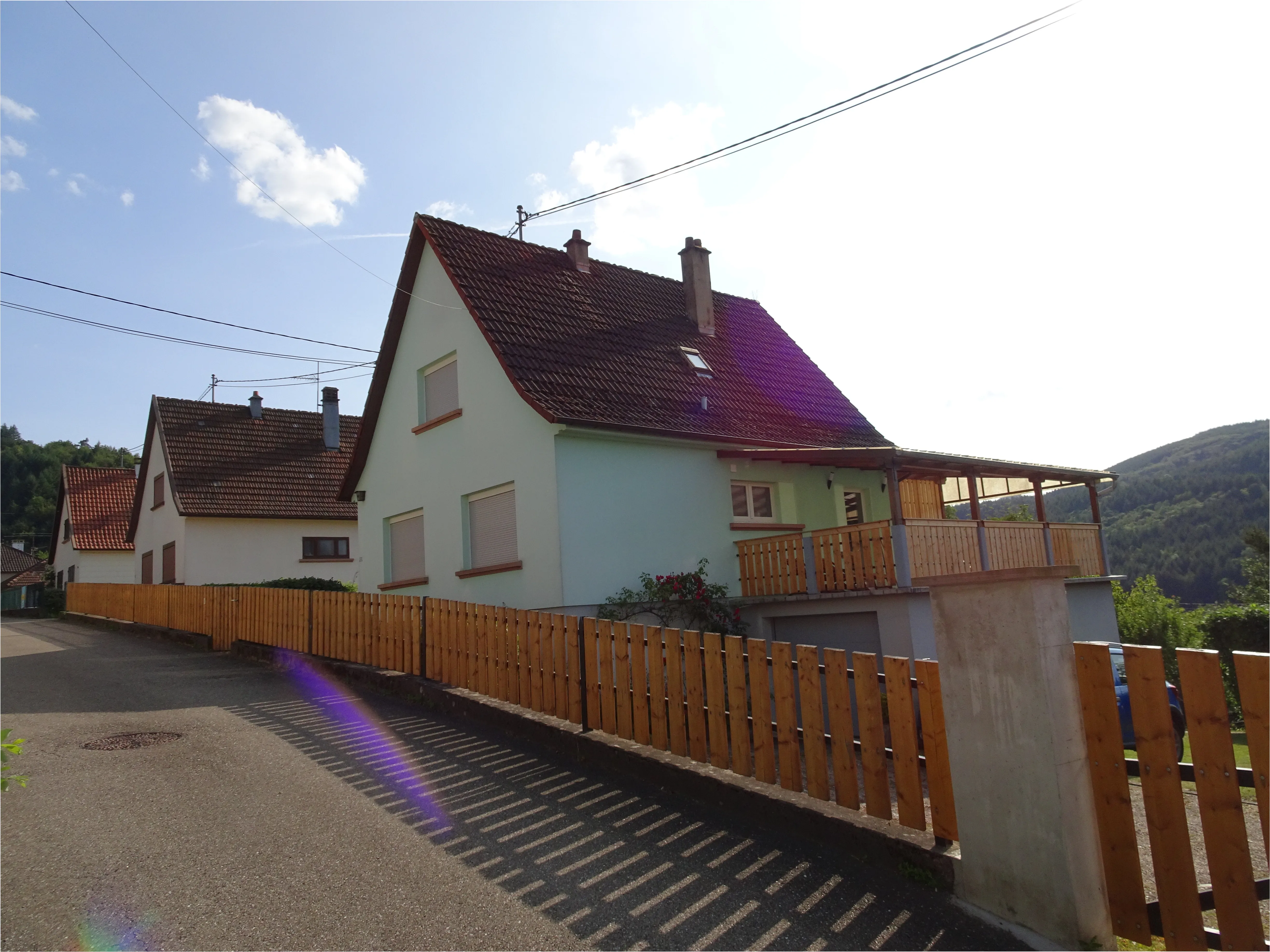 House exterior with terrace and mountain view